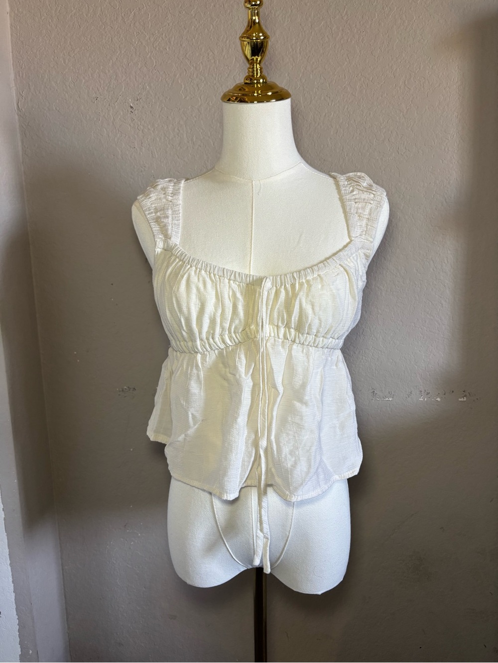 Ivory Peplum Ruffled Tank Top - Picture 1 of 5